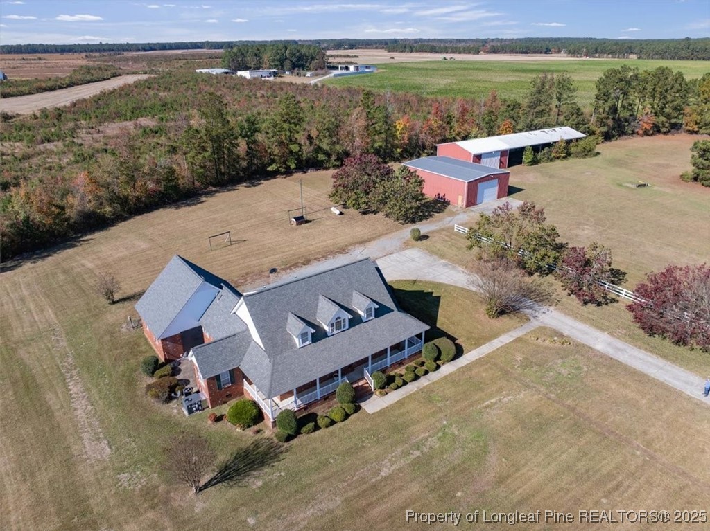 1594 Carroll Store Road Autryville, NC 28318 - Photo 7 of 36 an aerial view of a house with big yard