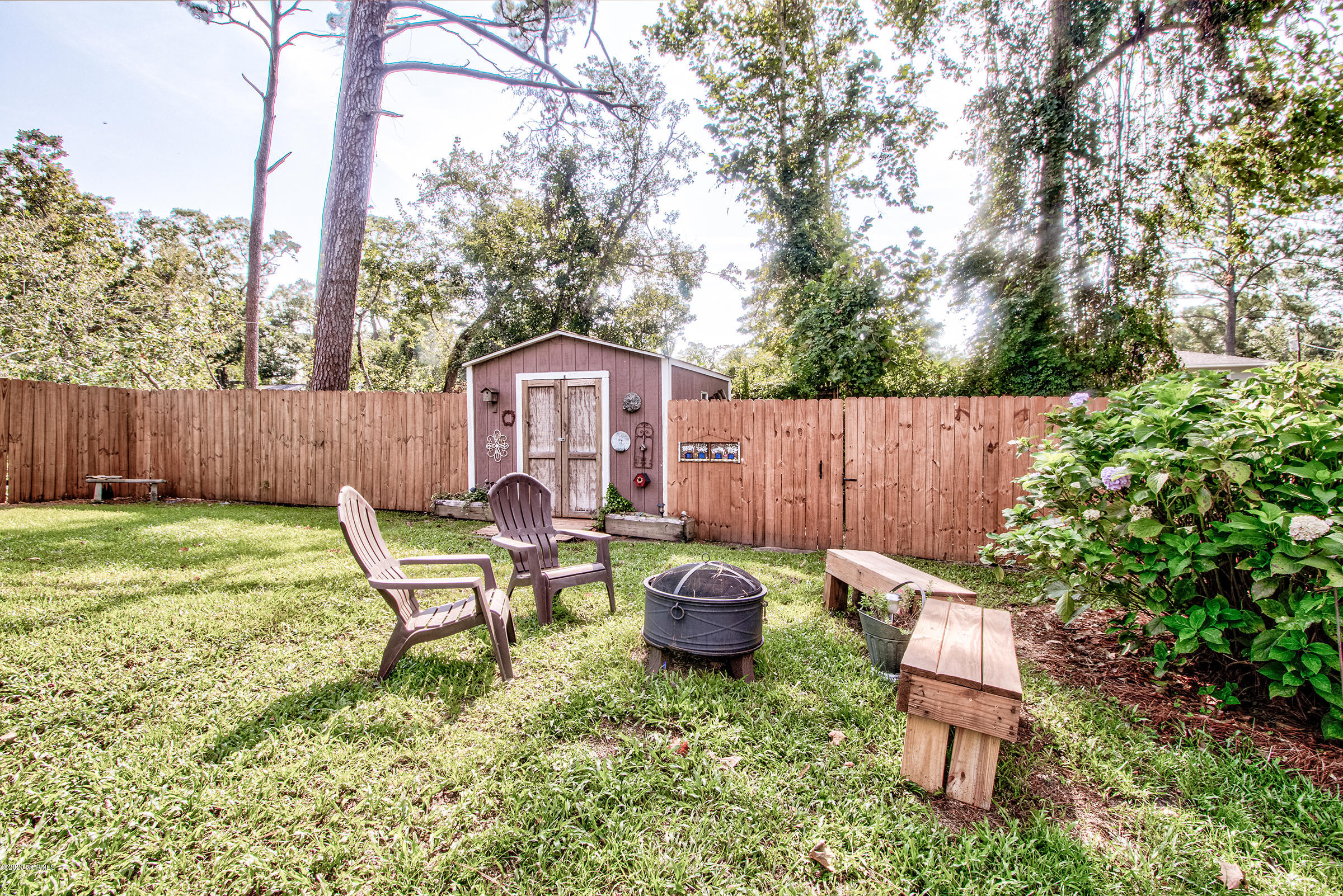 4113 Masonboro Loop Road Wilmington, NC 28409 - Photo 27 of 31 Fenced in Backyard with 2 sheds