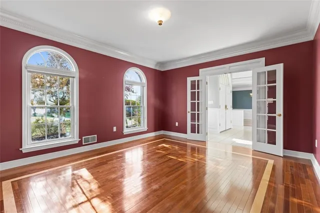 a view of a hallway to a bedroom