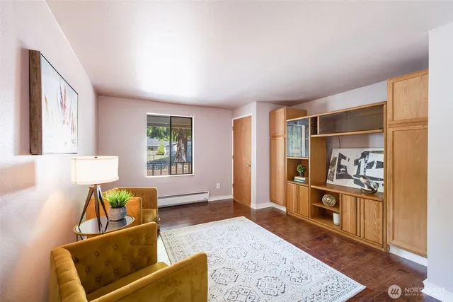 a living room with furniture and a window