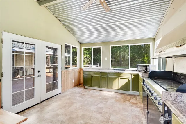 a view of a house with a large window