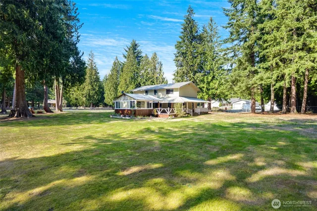 a view of a house with a big yard