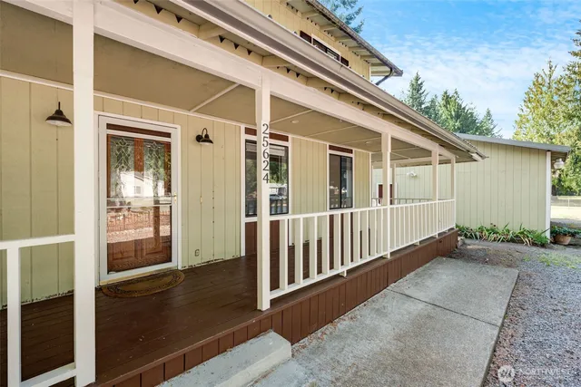 a view of backyard with deck