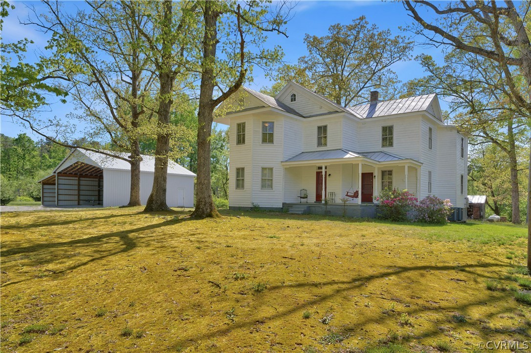 20011 Genito Road Moseley, VA 23120 - Photo 5 of 50 a front view of a house with a yard