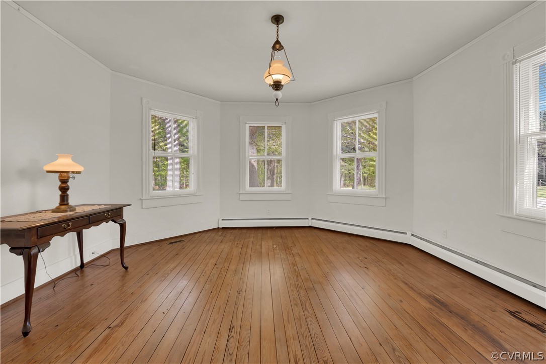 20011 Genito Road Moseley, VA 23120 - Photo 9 of 50 a view of a livingroom with wooden floor and a window