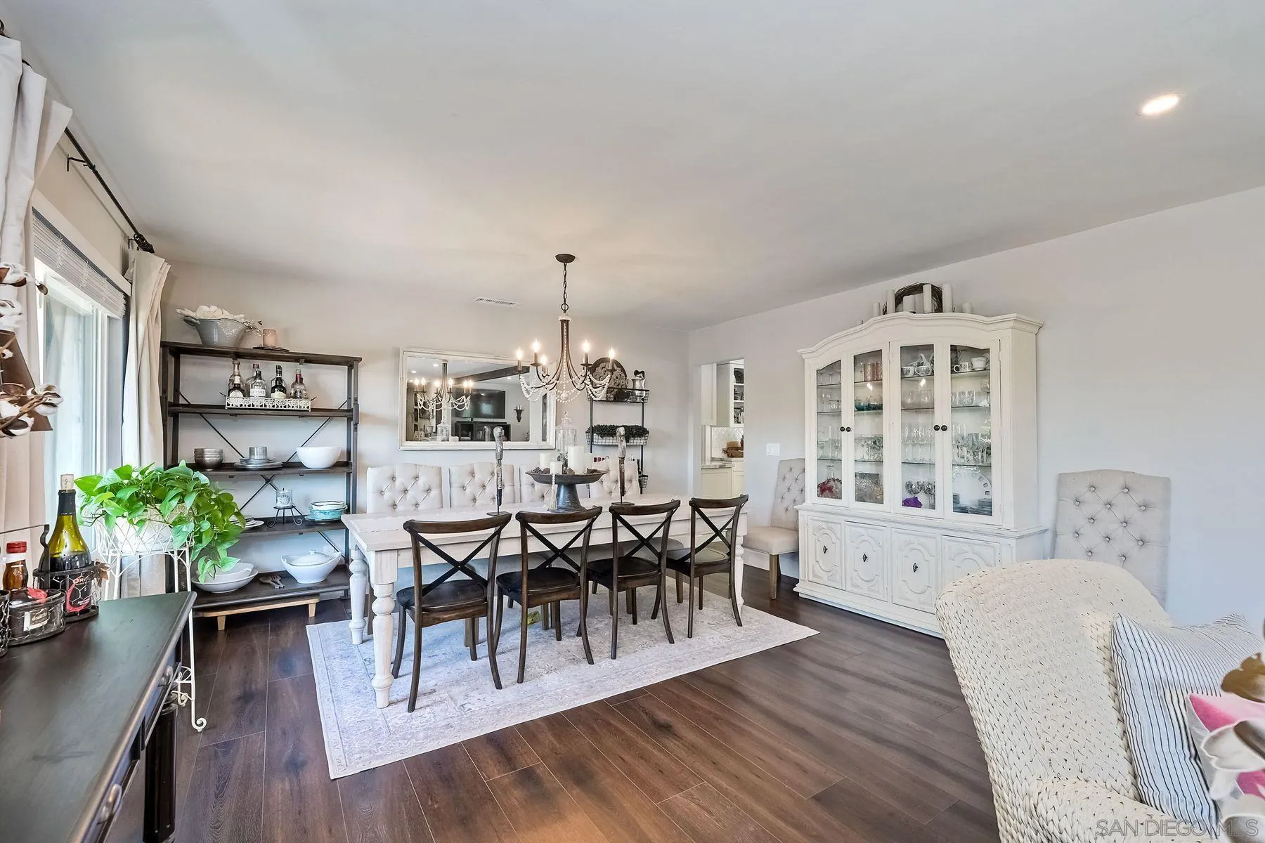 660 Via Rancho Parkway Escondido, CA 92029 - Photo 11 of 37 a view of a dining room with furniture and wooden floor