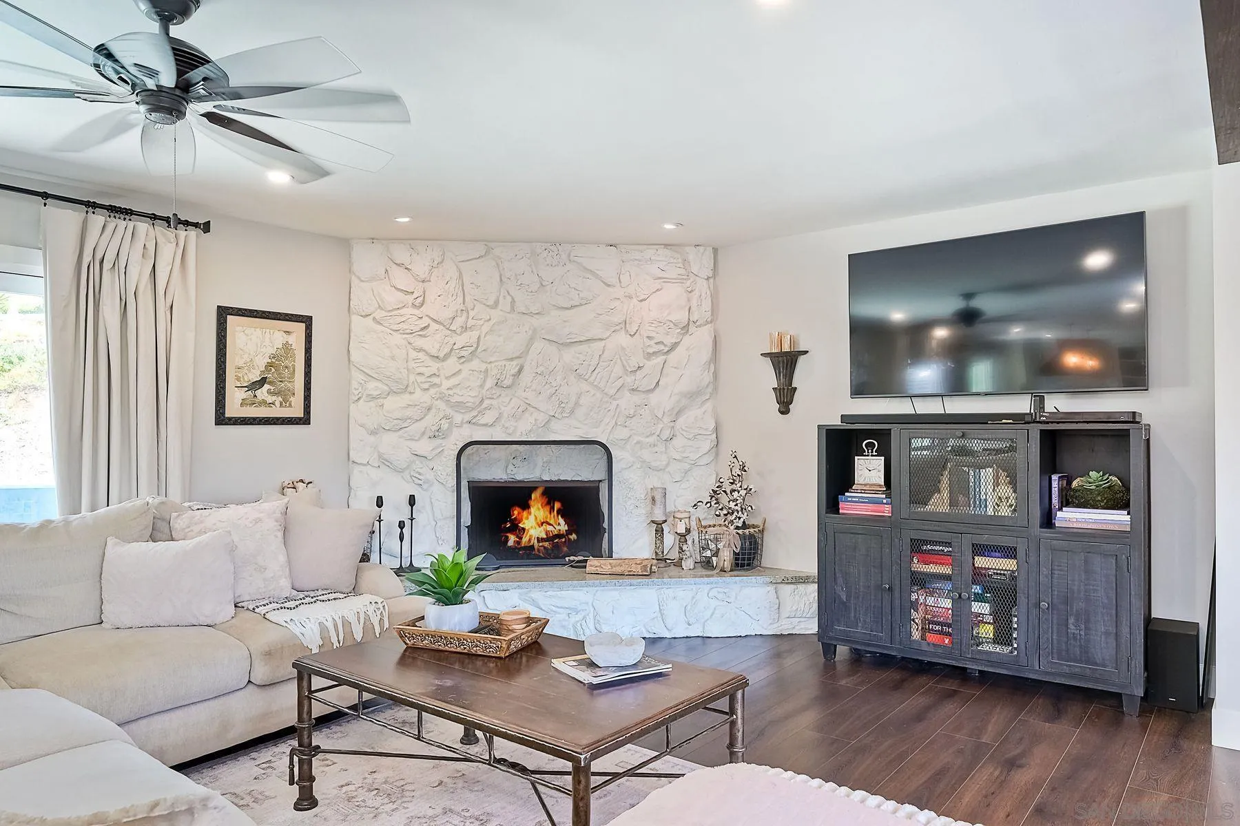 660 Via Rancho Parkway Escondido, CA 92029 - Photo 17 of 37 a living room with furniture and a fireplace