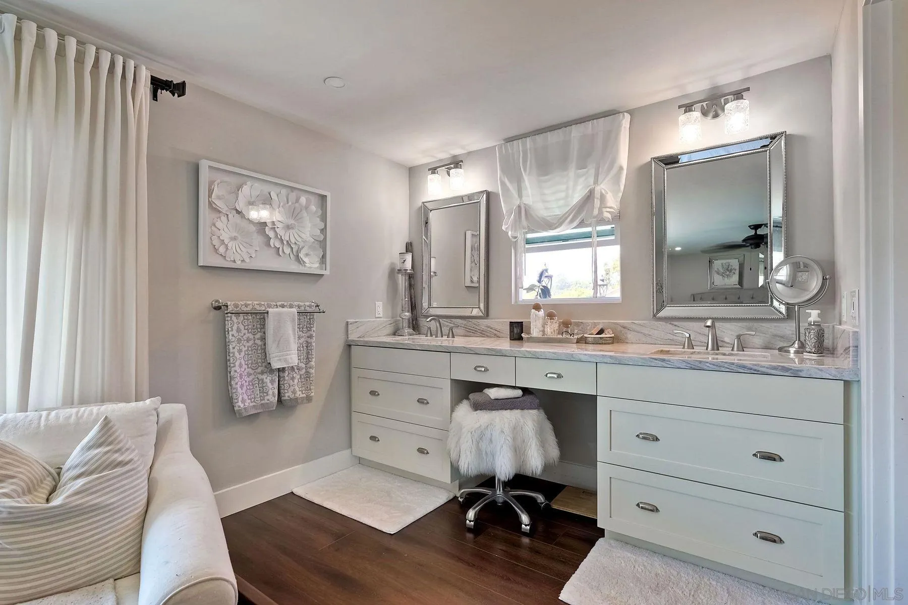 660 Via Rancho Parkway Escondido, CA 92029 - Photo 20 of 37 a spacious bathroom with a double vanity sink a mirror a bathtub and a window