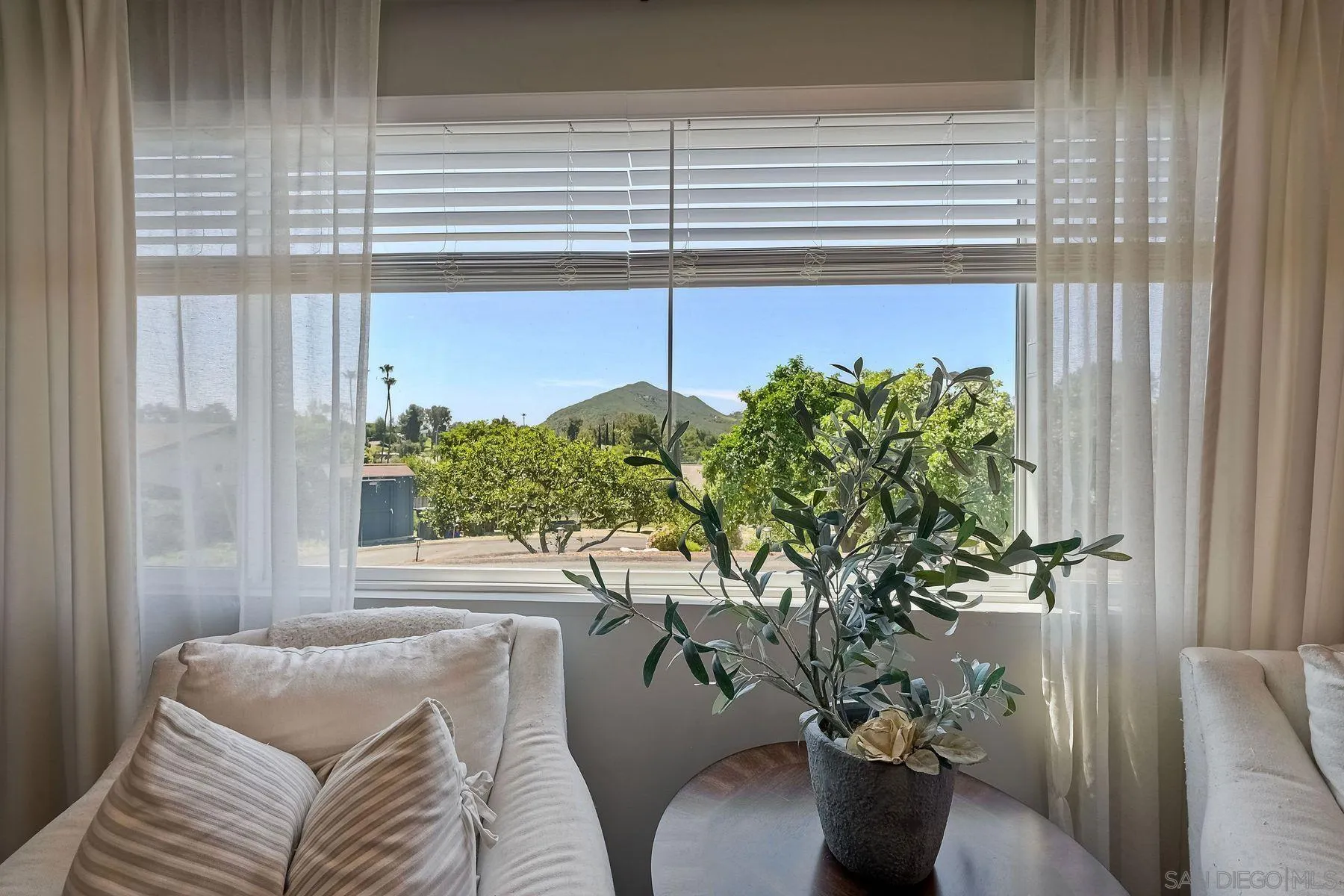 660 Via Rancho Parkway Escondido, CA 92029 - Photo 21 of 37 a vase of flowers sitting on a table