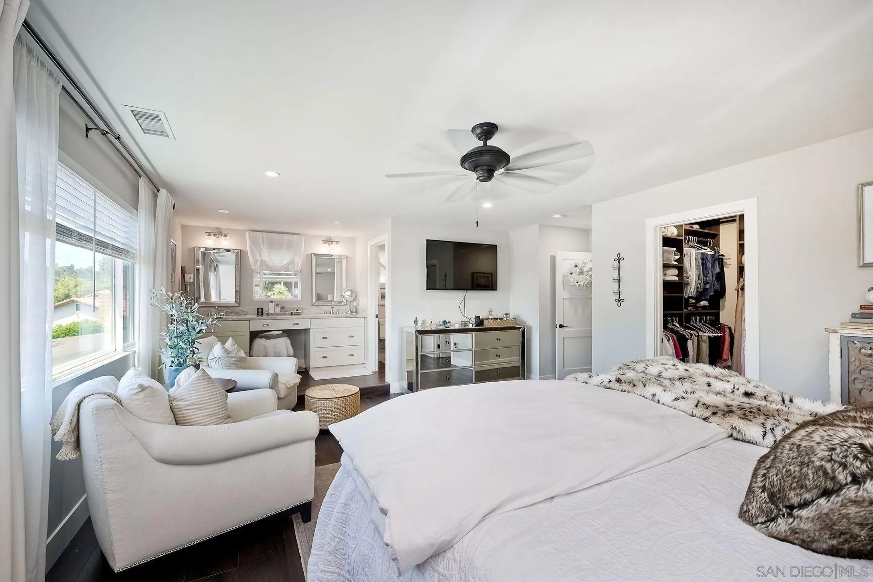 660 Via Rancho Parkway Escondido, CA 92029 - Photo 22 of 37 a living room with furniture a flat screen tv and a large window