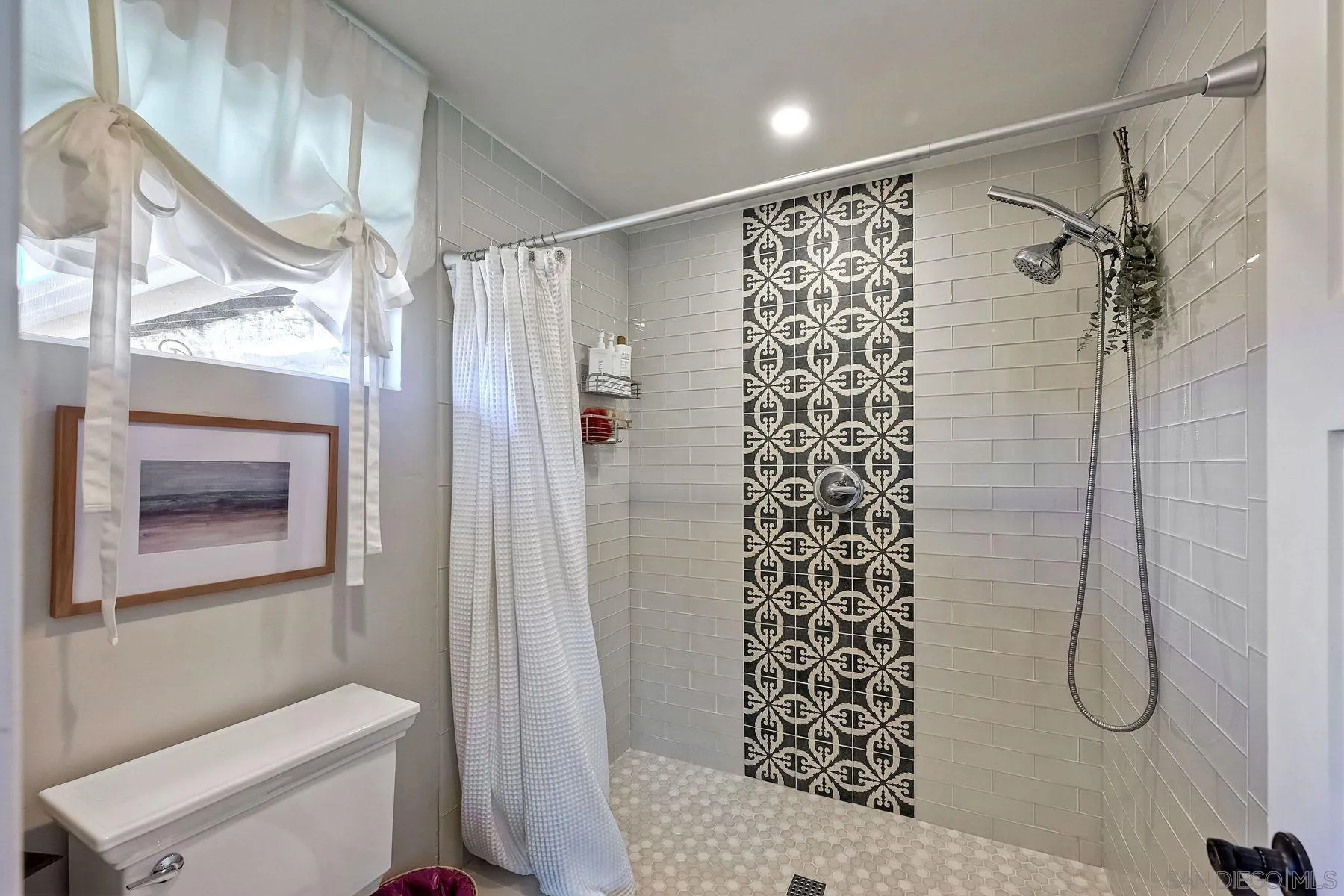 660 Via Rancho Parkway Escondido, CA 92029 - Photo 25 of 37 a bathroom with a shower and a toilet