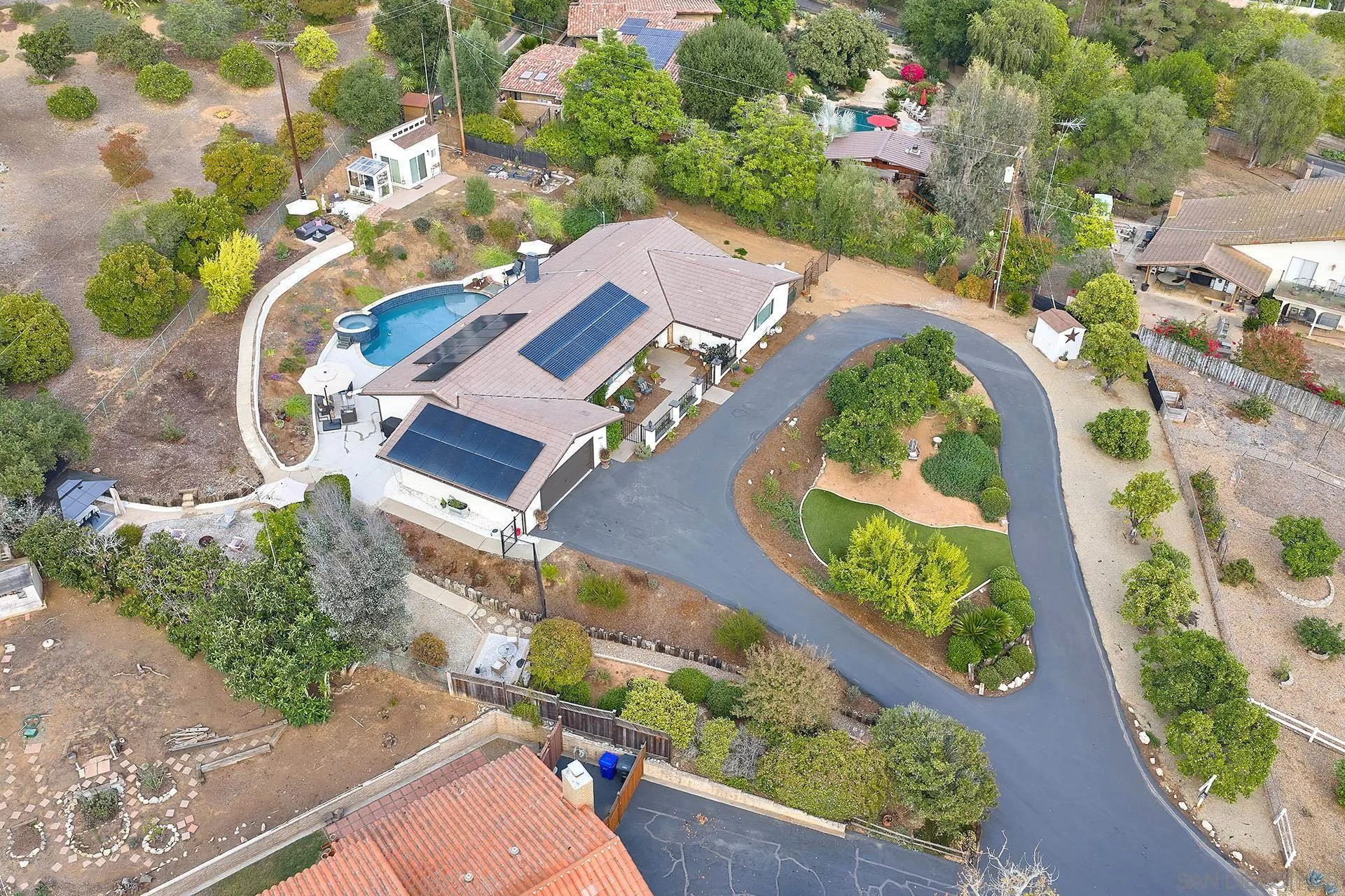 660 Via Rancho Parkway Escondido, CA 92029 - Photo 28 of 37 an aerial view of a house with a garden