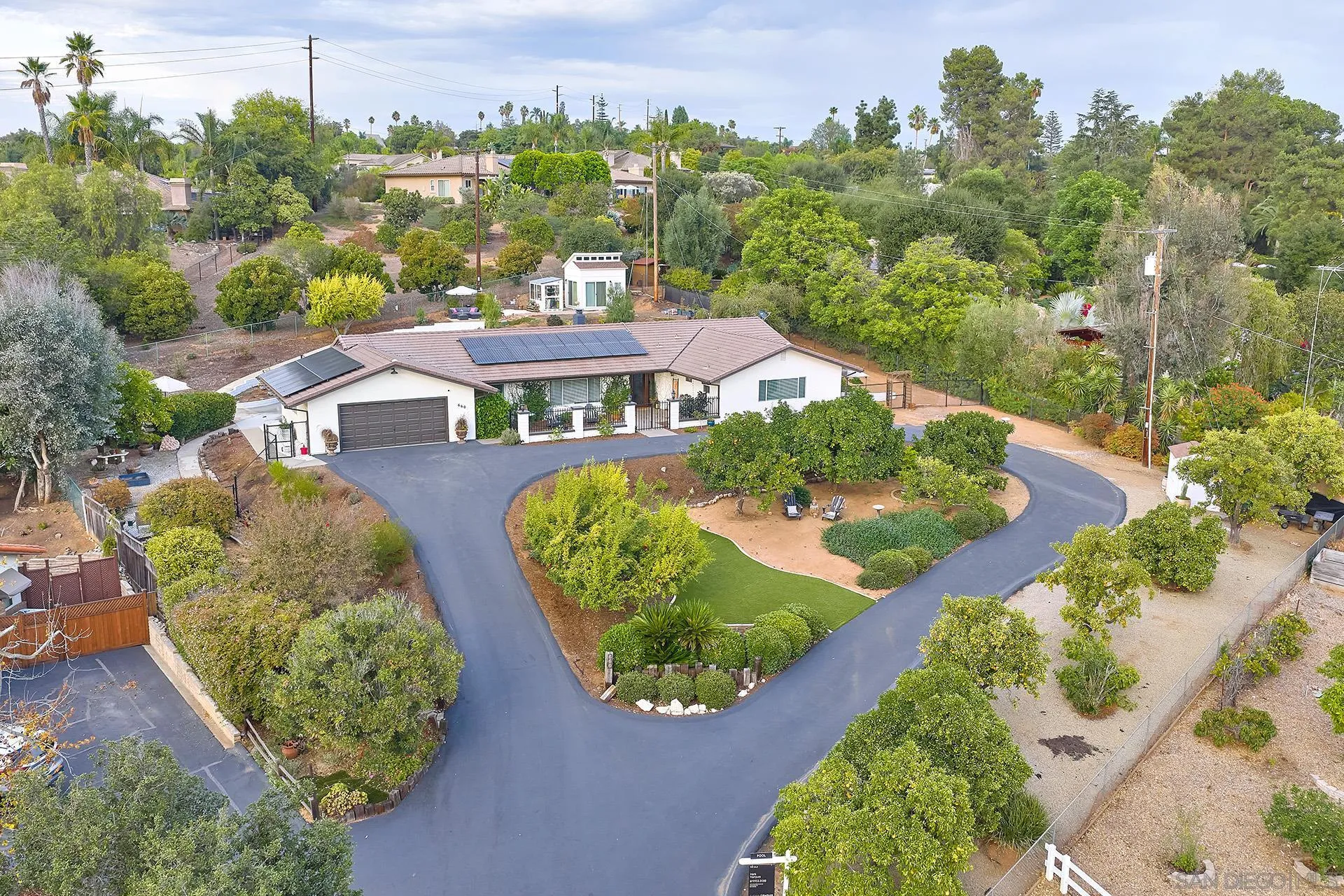 660 Via Rancho Parkway Escondido, CA 92029 - Photo 29 of 37 an aerial view of a house with yard swimming pool and outdoor seating