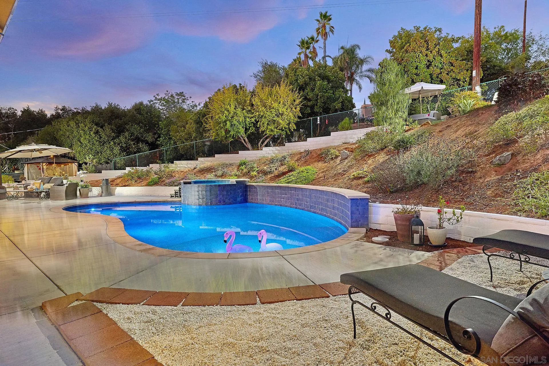 660 Via Rancho Parkway Escondido, CA 92029 - Photo 3 of 37 a view of a swimming pool with a patio