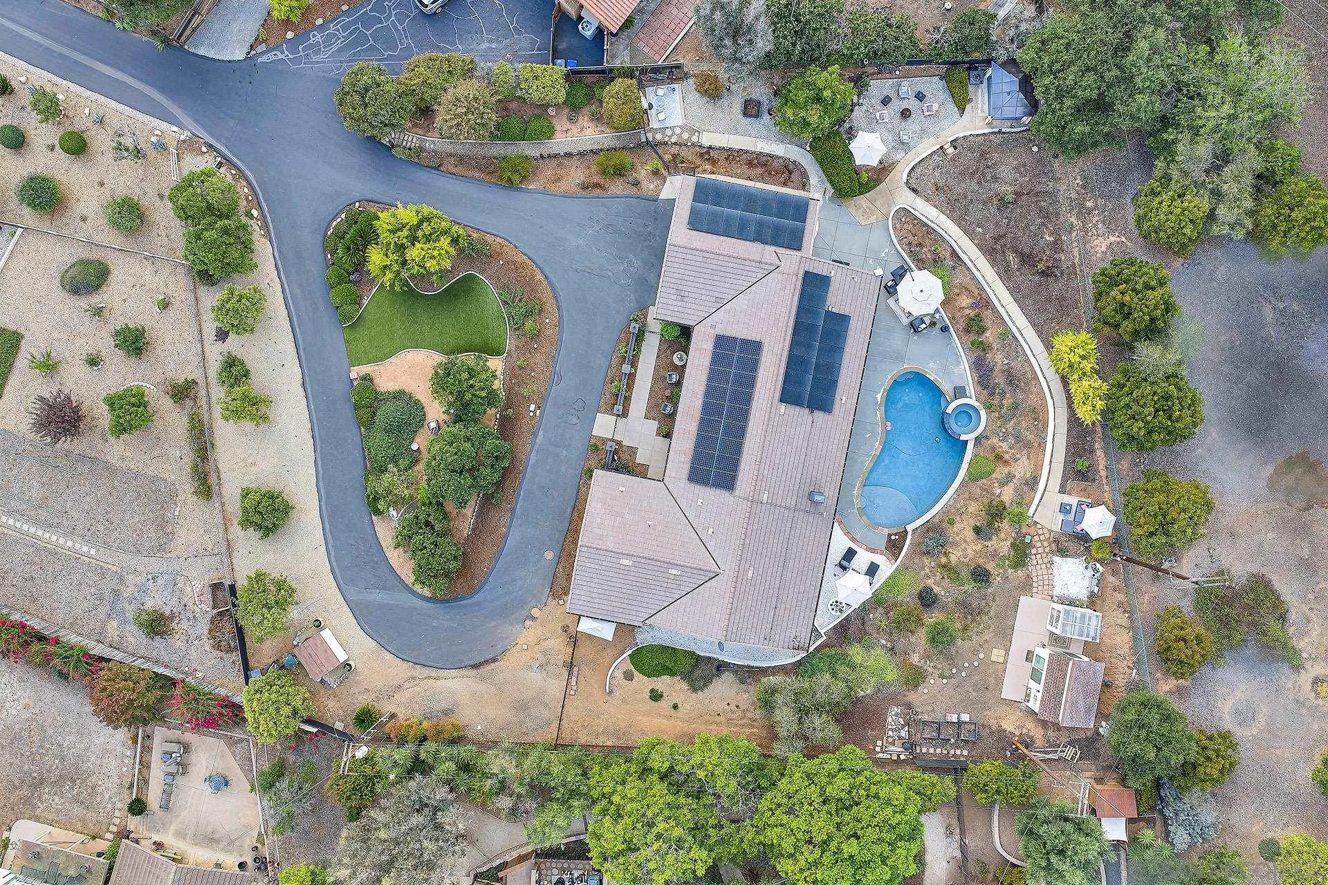 660 Via Rancho Parkway Escondido, CA 92029 - Photo 35 of 37 an aerial view of a swimming pool with outdoor seating and yard
