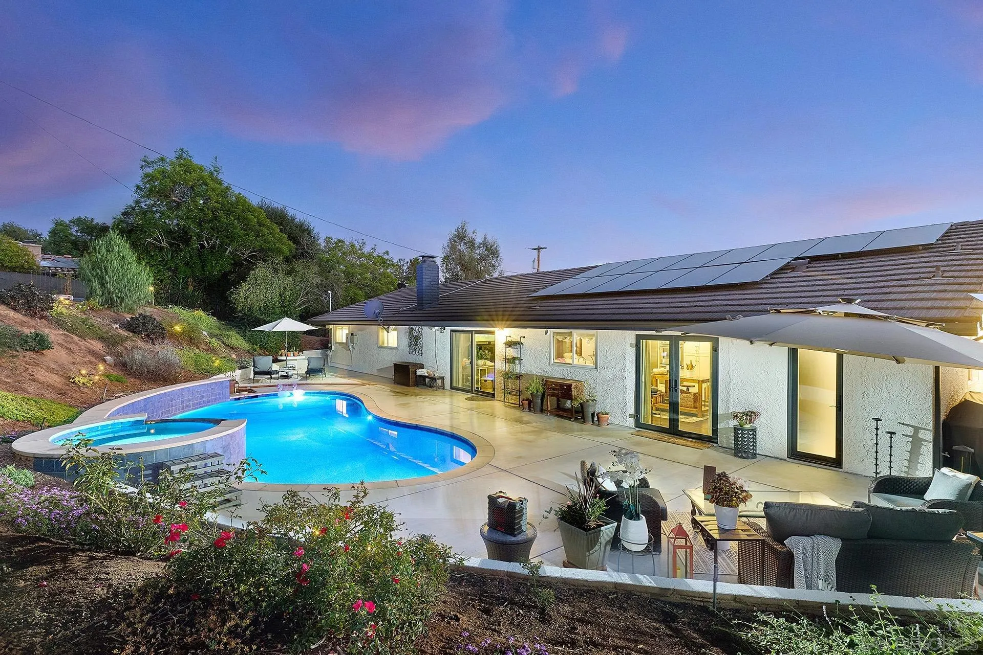 660 Via Rancho Parkway Escondido, CA 92029 - Photo 4 of 37 a view of a swimming pool with outdoor seating