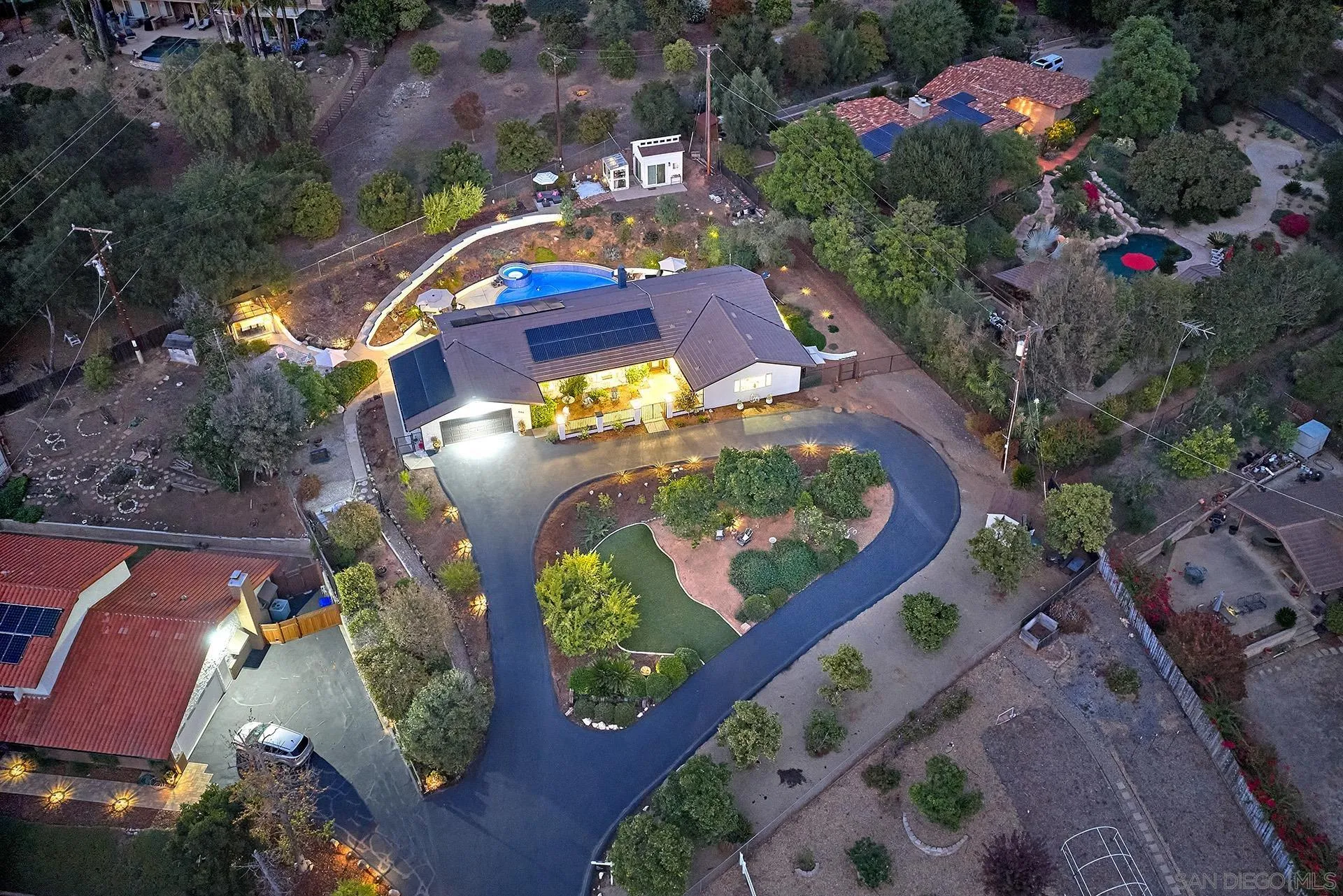 660 Via Rancho Parkway Escondido, CA 92029 - Photo 5 of 37 an aerial view of a house with a swimming pool