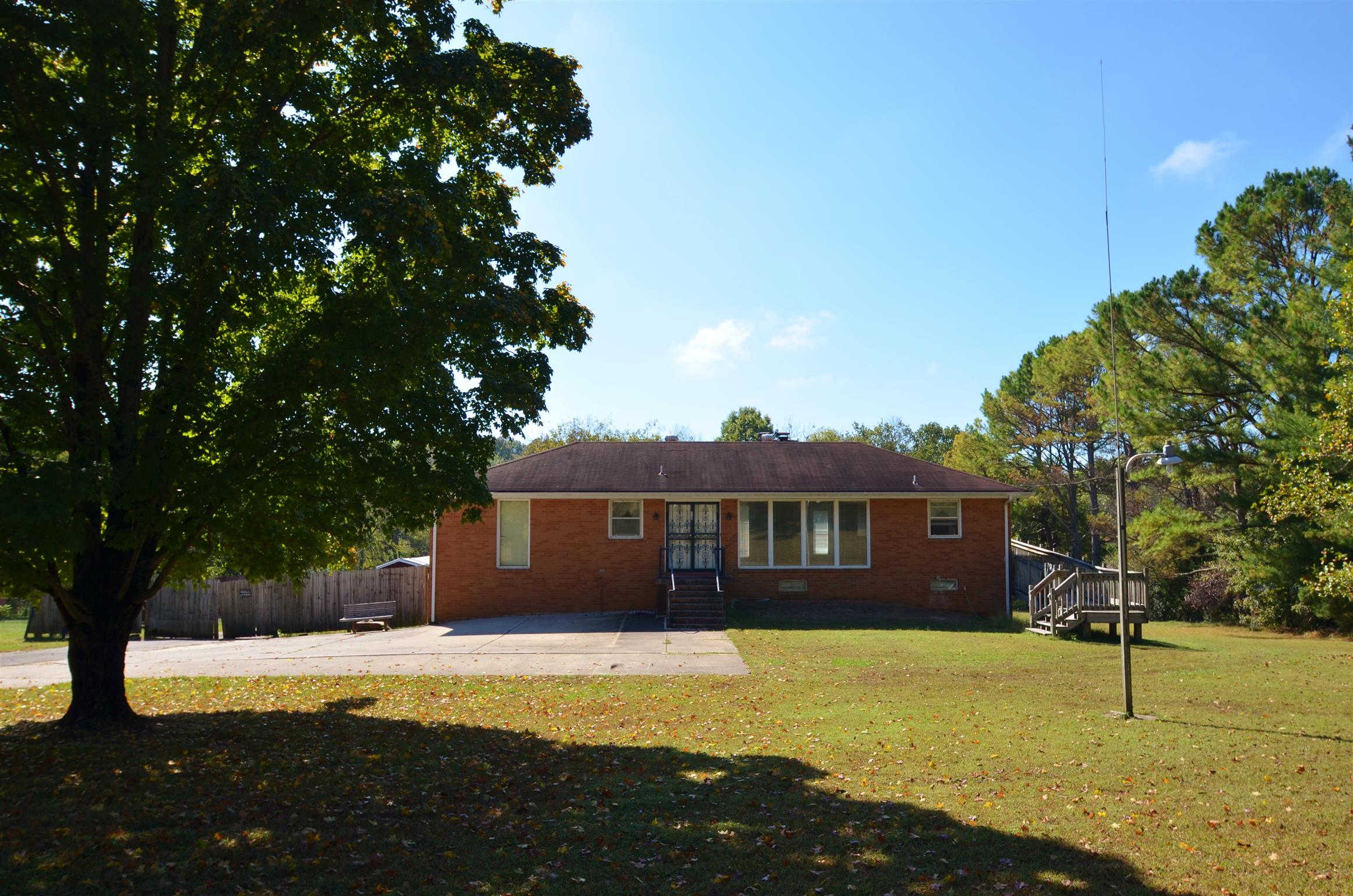 7790 Lebanon Road Mount Juliet, TN 37122 - Photo 1 of 11 a view of a house with swimming pool and a yard