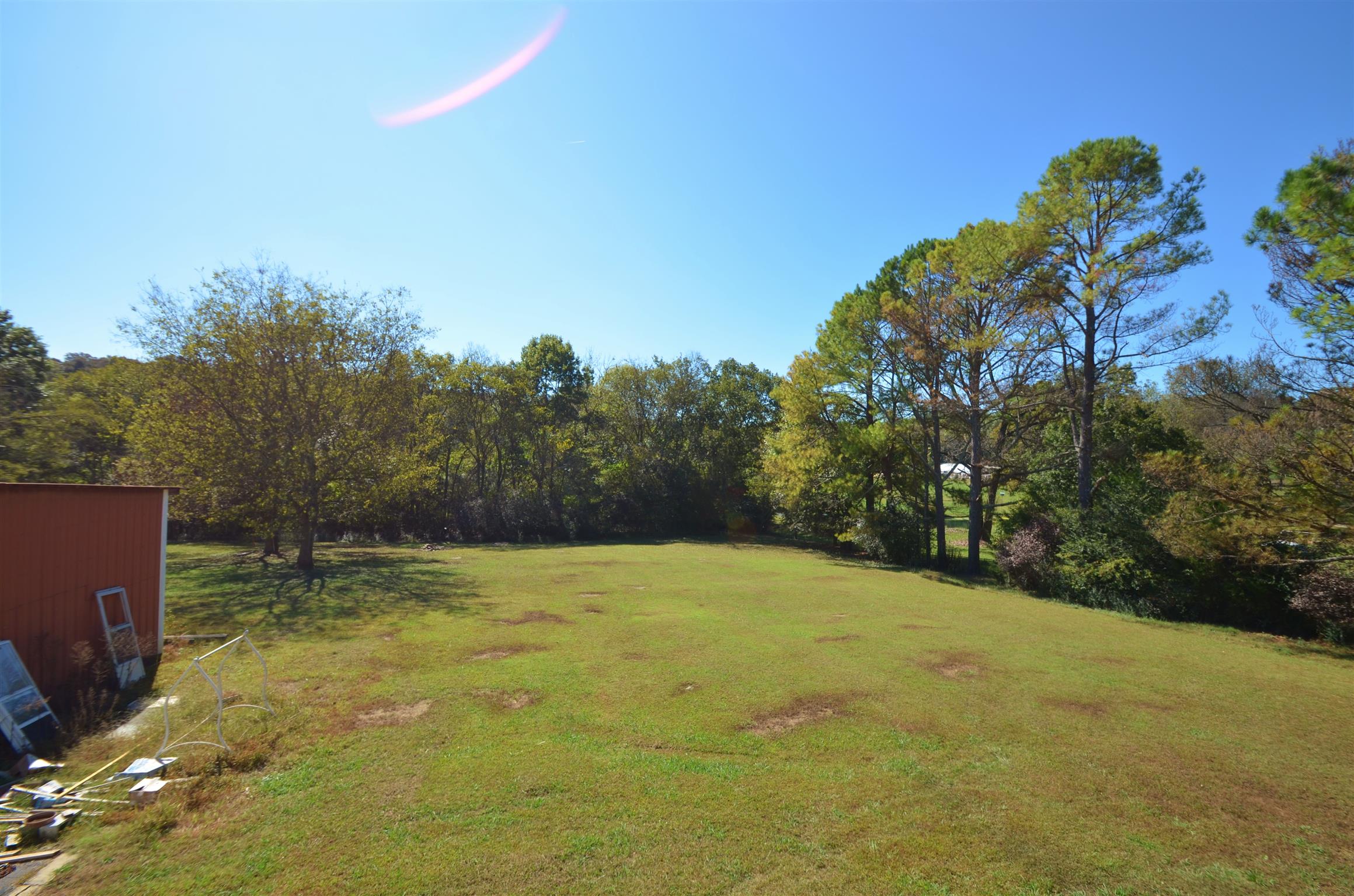7790 Lebanon Road Mount Juliet, TN 37122 - Photo 11 of 11 a backyard of a house with lots of green space