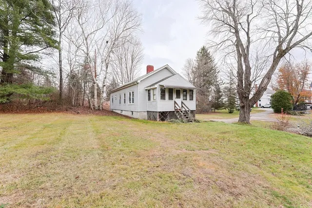 a house with trees in front of it