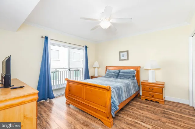 a bedroom with a bed and a table in it