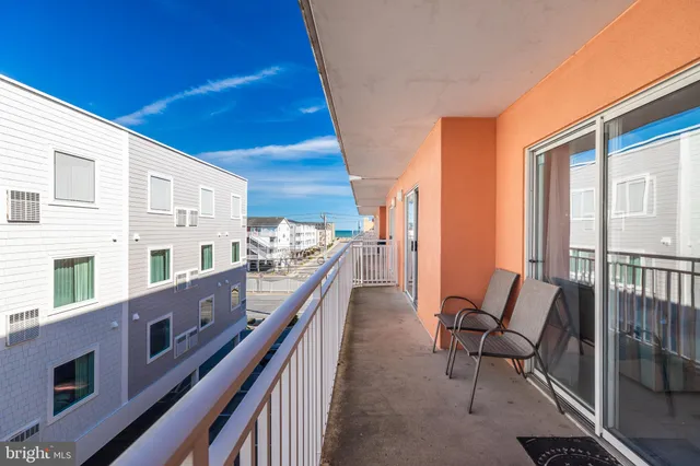 a view of balcony with furniture