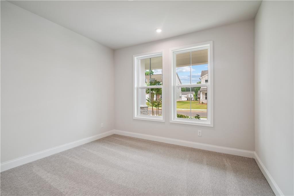 719 Crossroad Court Southwest Powder Springs, GA 30127 - Photo 26 of 27 an empty room with a window