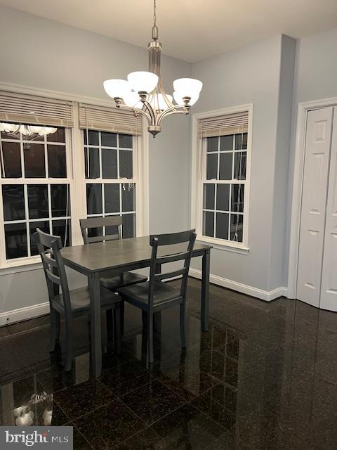 3659 White Hall Road King George, VA 22485 - Photo 12 of 36 a view of a dining room with furniture and wooden floor