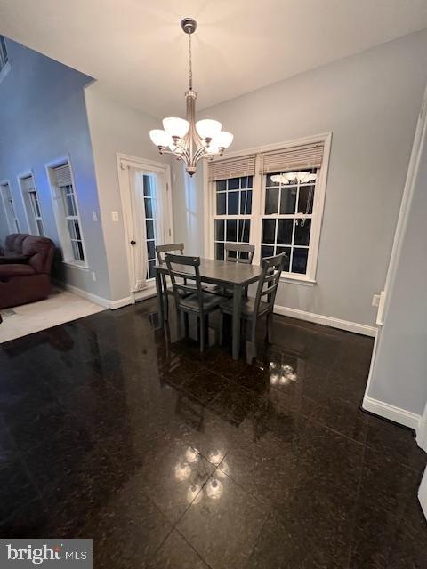 3659 White Hall Road King George, VA 22485 - Photo 14 of 36 a view of a dining room with furniture wooden floor and chandelier