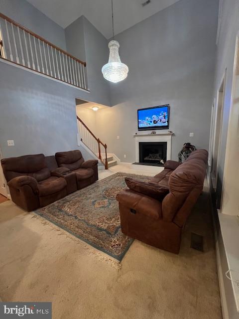 3659 White Hall Road King George, VA 22485 - Photo 17 of 36 a living room with furniture a fireplace and a flat screen tv