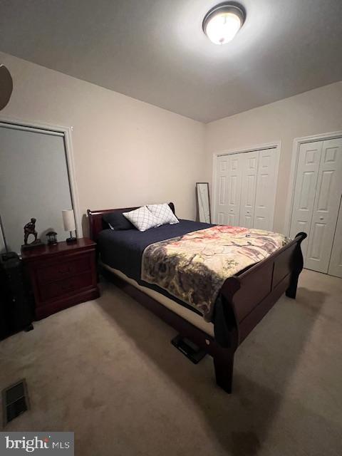 3659 White Hall Road King George, VA 22485 - Photo 19 of 36 a bed sitting in a bedroom next to a window