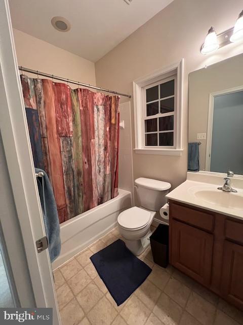 3659 White Hall Road King George, VA 22485 - Photo 21 of 36 a bathroom with a sink a toilet a mirror and a shower
