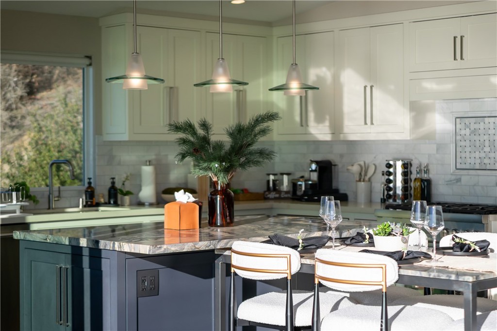 2192 Crestview Drive Laguna Beach, CA 92651 - Photo 17 of 54 a kitchen with a sink and white appliances
