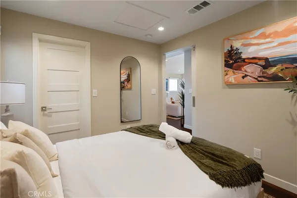 a bathroom with a shower and a sink