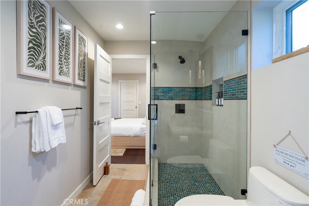 2192 Crestview Drive Laguna Beach, CA 92651 - Photo 43 of 54 a bathroom with a shower and a sink