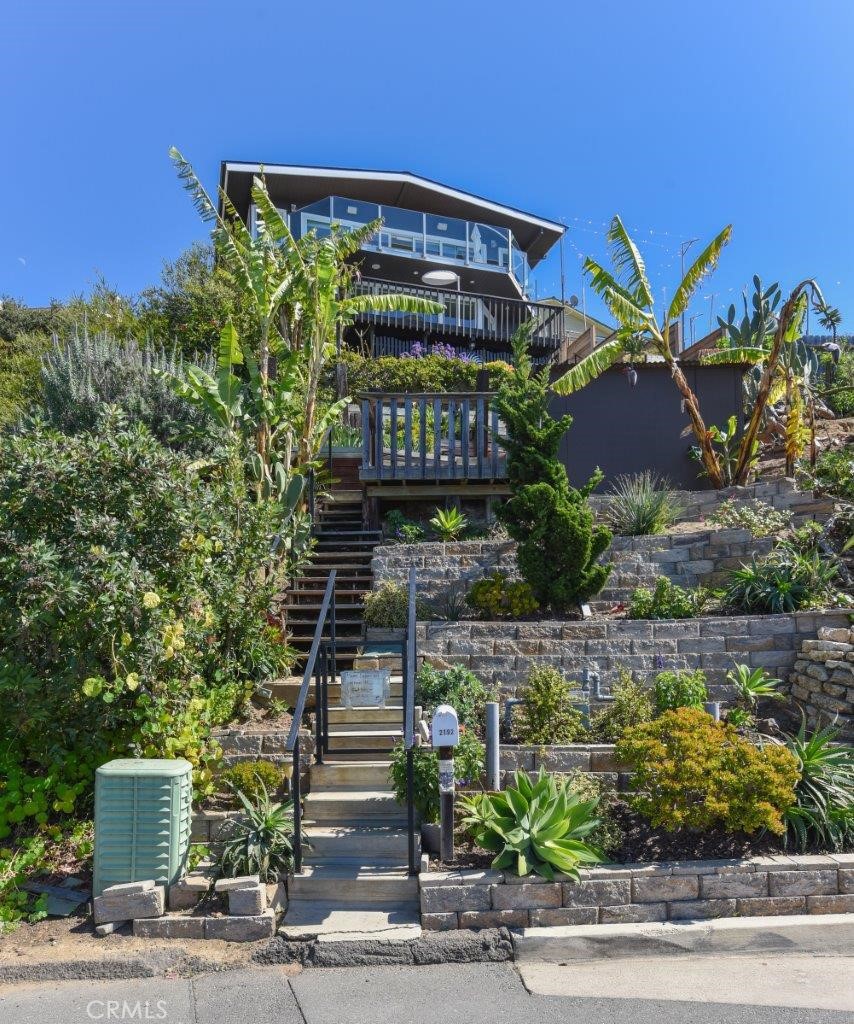 2192 Crestview Drive Laguna Beach, CA 92651 - Photo 54 of 54 a front view of a house with a yard