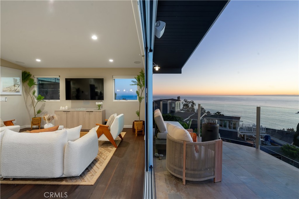 2192 Crestview Drive Laguna Beach, CA 92651 - Photo 8 of 54 a living room with furniture and a view of living room