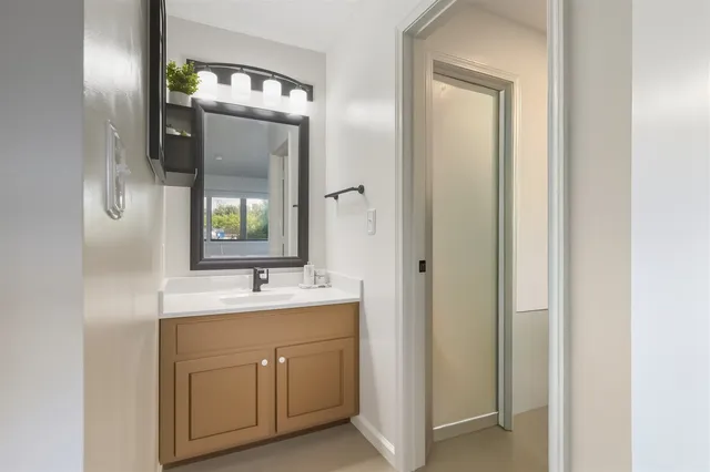 a bathroom with a toilet and a sink