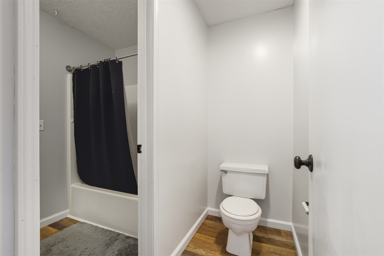 1916 Tracy Drive, Unit 26 Bloomington, IL 61704 - Photo 21 of 23 a bathroom with a toilet and a sink