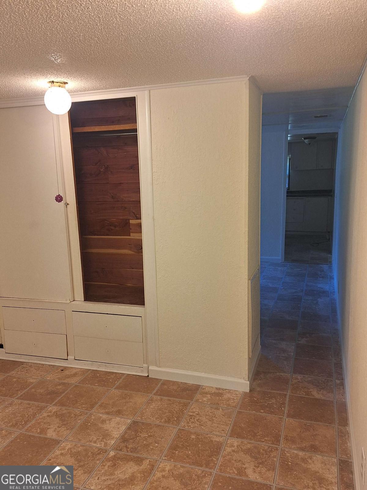 163 High Bluff Road Baxley, GA 31513 - Photo 12 of 52 an empty room with closet