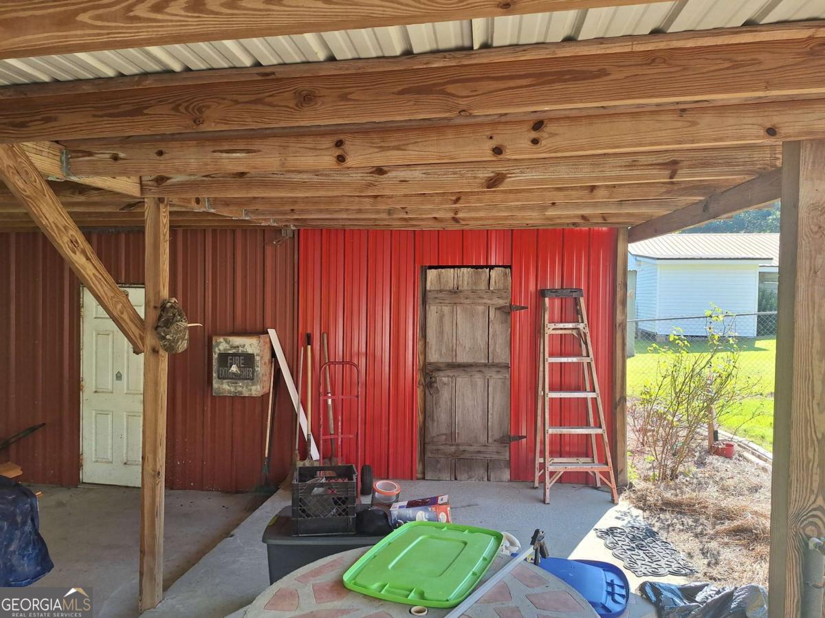 163 High Bluff Road Baxley, GA 31513 - Photo 26 of 52 a view of a room with gym equipment