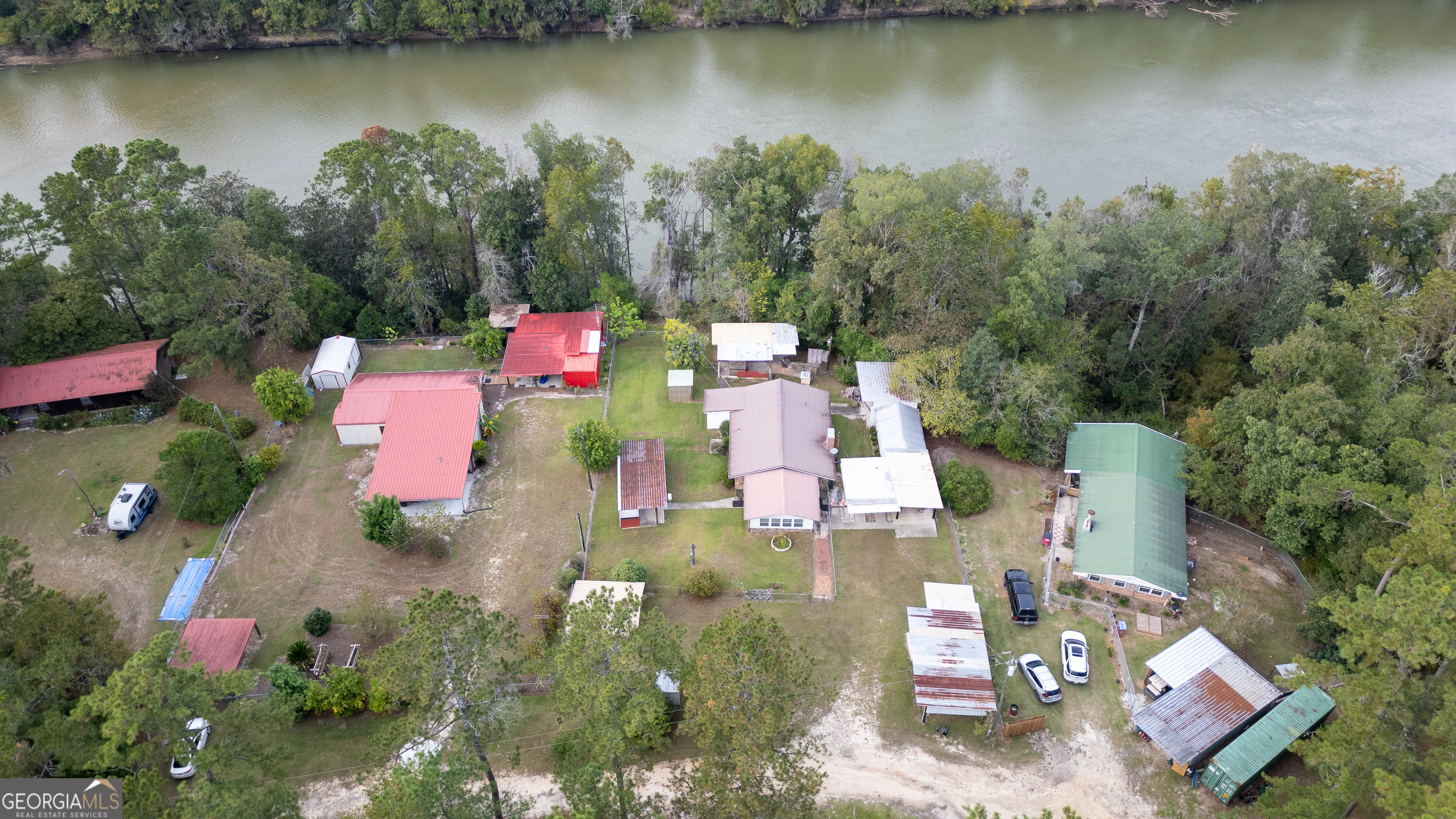 163 High Bluff Road Baxley, GA 31513 - Photo 39 of 52 an aerial view of house with yard and lake view