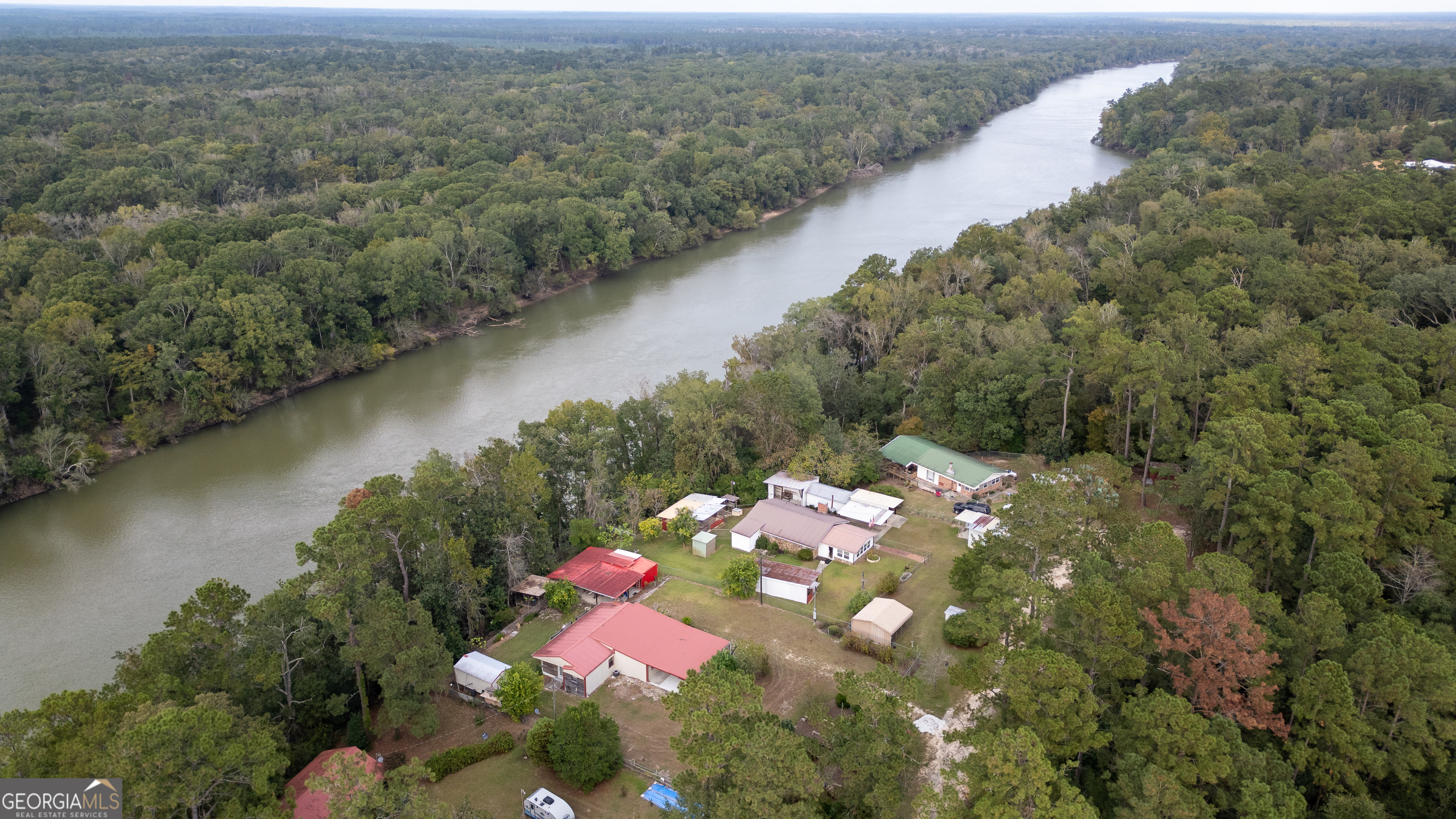 163 High Bluff Road Baxley, GA 31513 - Photo 41 of 52 a view of a lake with a mountain