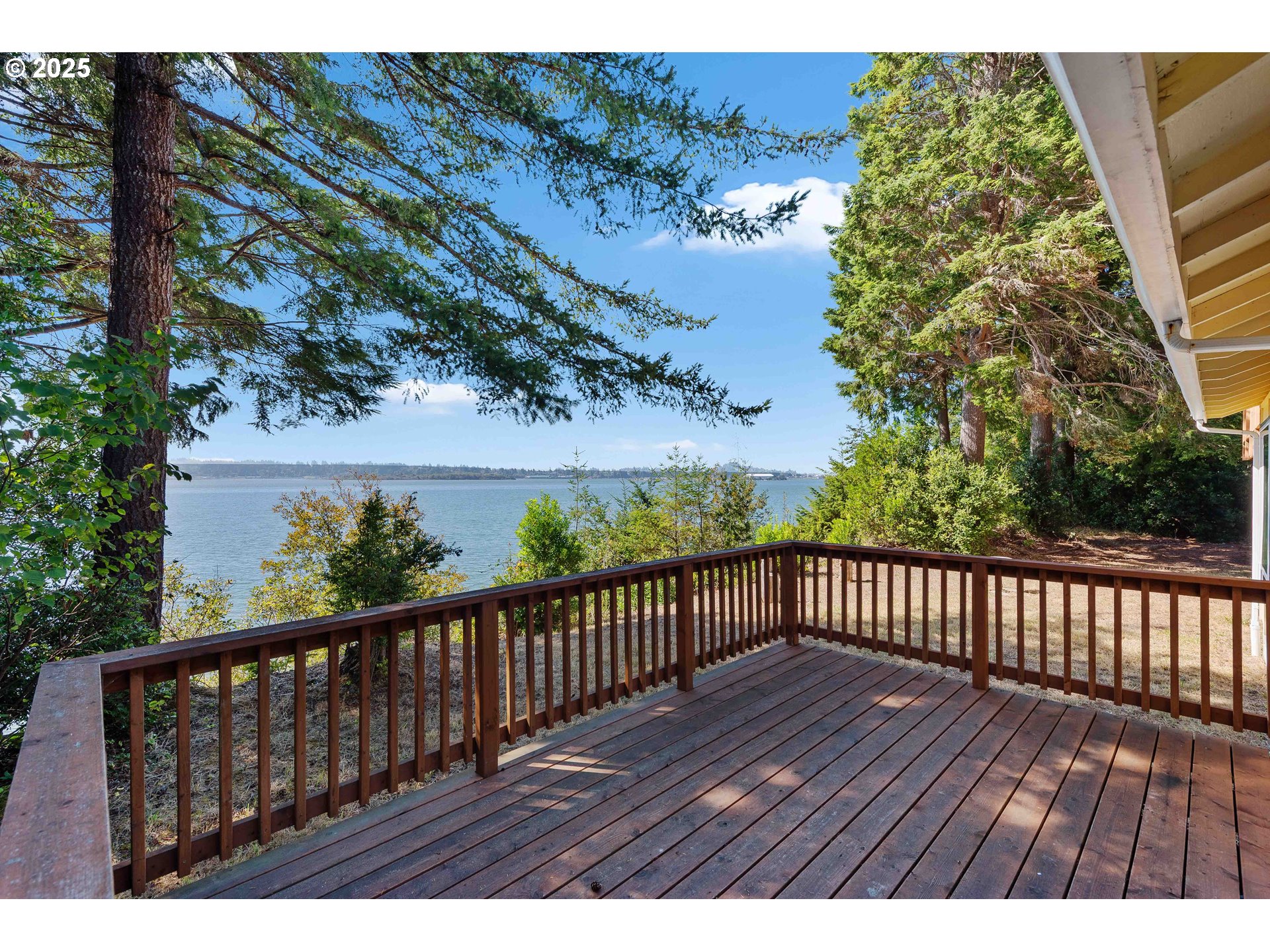 64662 East Bay Road North Bend, OR 97459 - Photo 16 of 48 a view of balcony with wooden floor