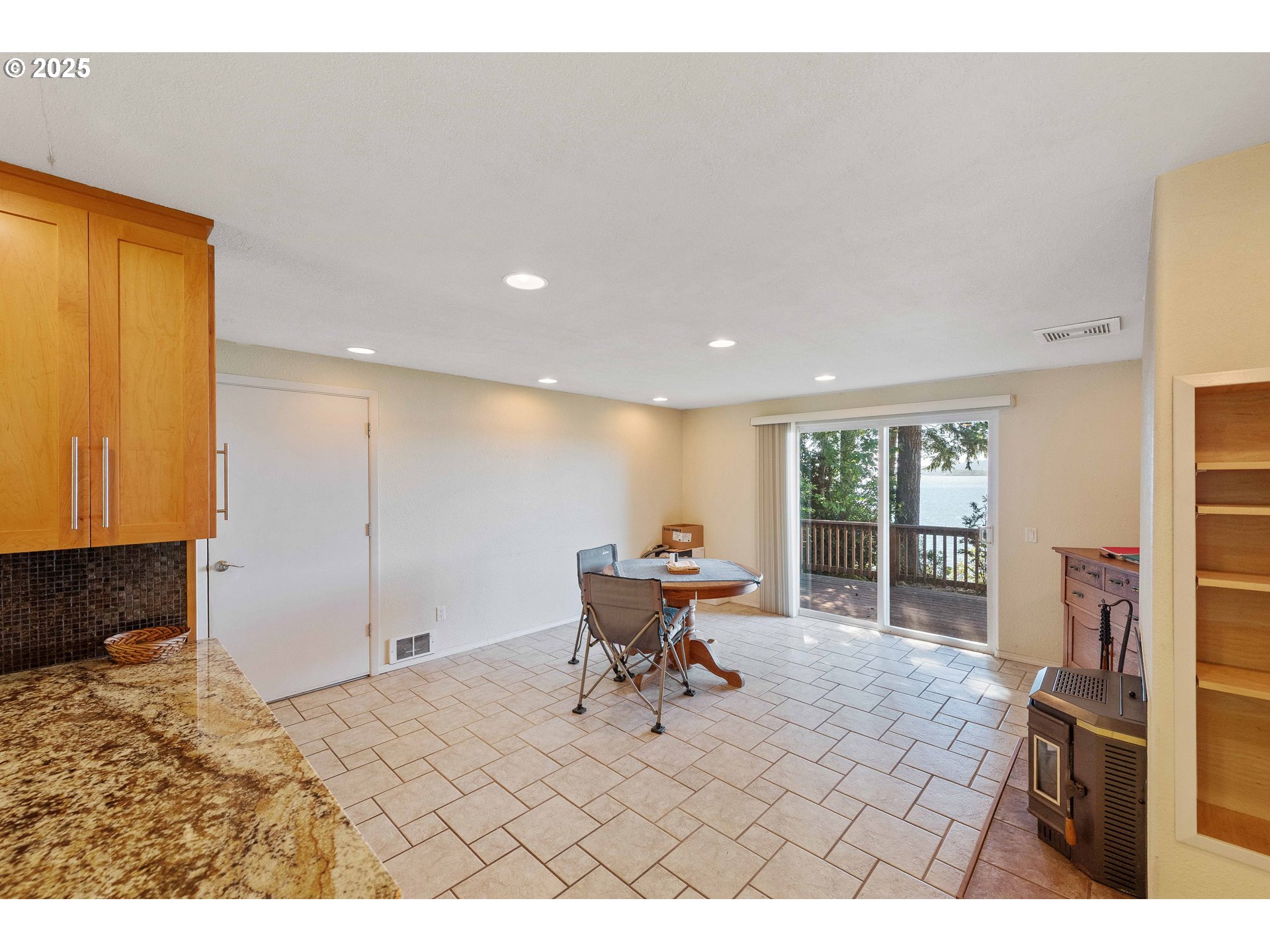 64662 East Bay Road North Bend, OR 97459 - Photo 17 of 48 a view of a living room and a window