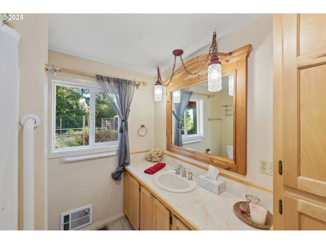 a bedroom with a bed and a shower