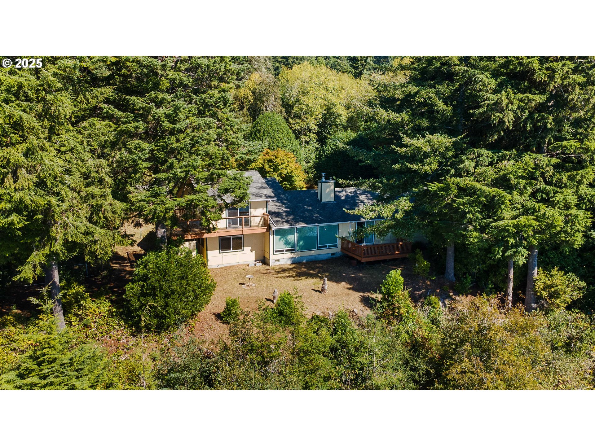 64662 East Bay Road North Bend, OR 97459 - Photo 5 of 48 a open area with green field