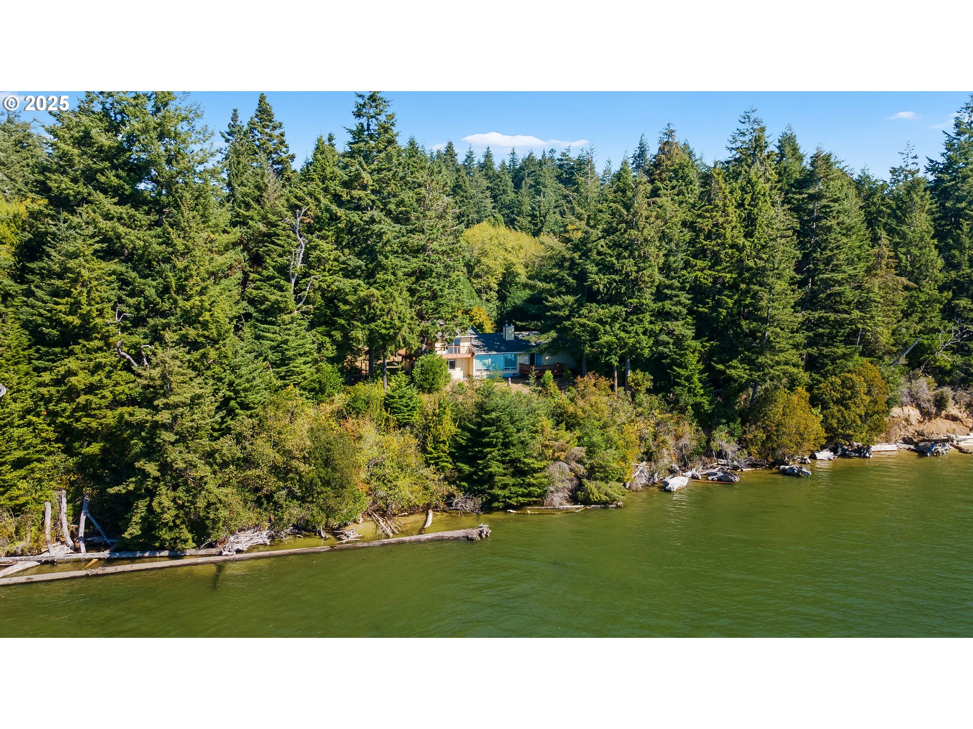 64662 East Bay Road North Bend, OR 97459 - Photo 7 of 48 a black and white photo of a field