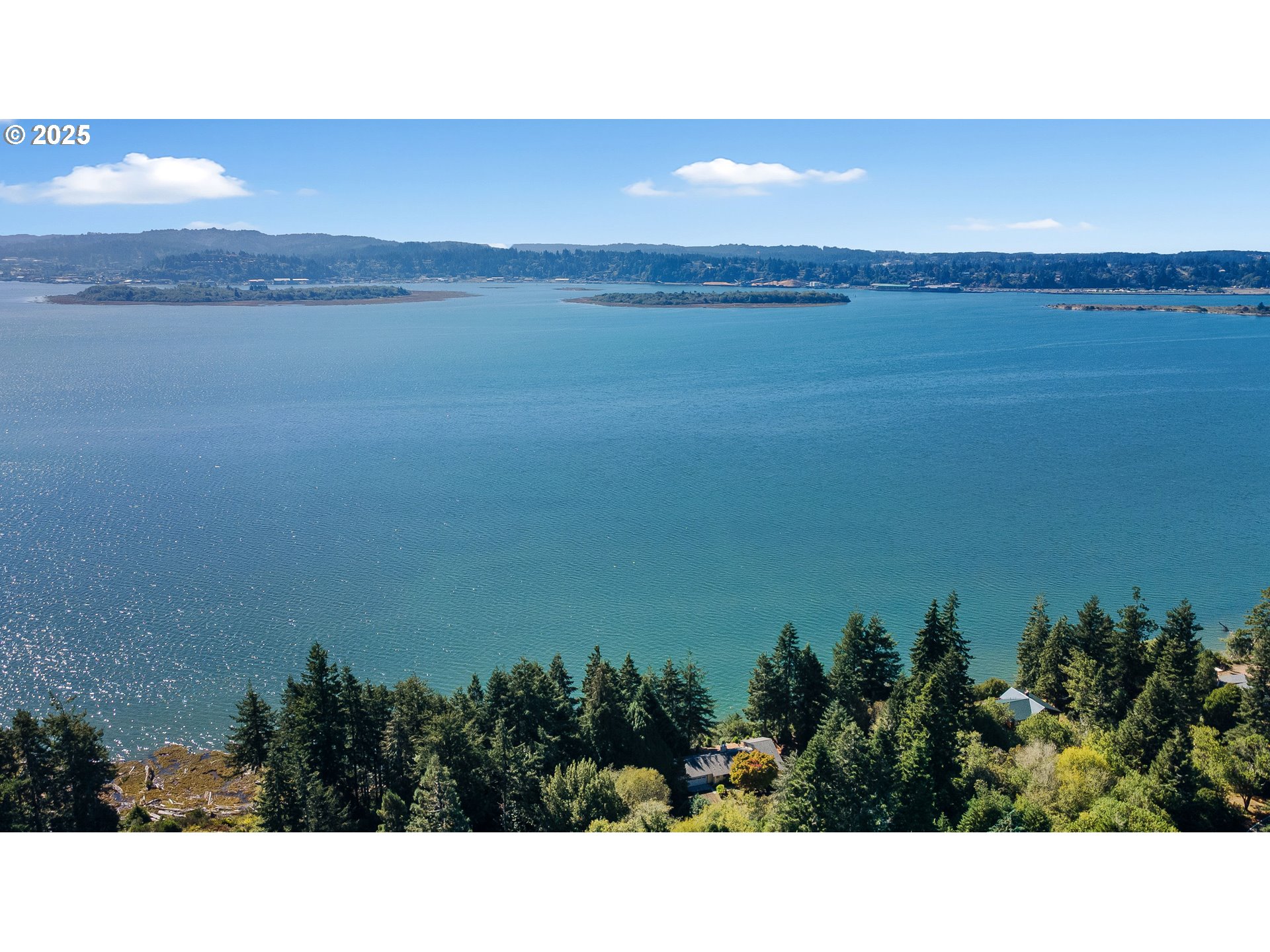 64662 East Bay Road North Bend, OR 97459 - Photo 8 of 48 a view of lake and mountain