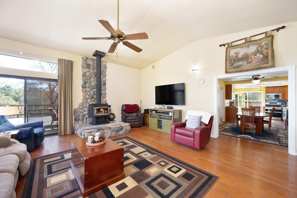 6930 Loggers Hollow Road Somerset, CA 95684 - Photo 15 of 42 a living room with furniture and a flat screen tv
